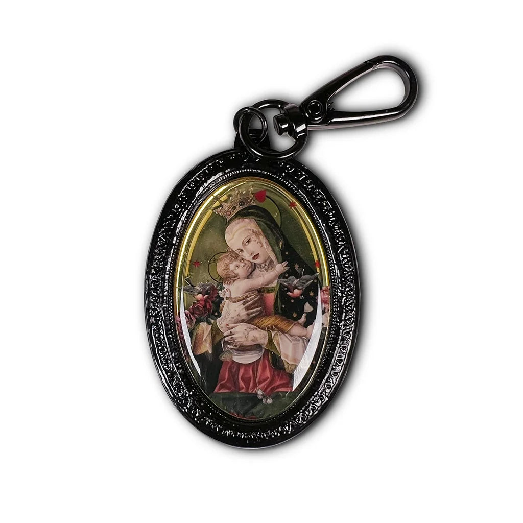 Porte-clés noir et or "Le divin enfant" par la créatrice VOGLIO BENE.